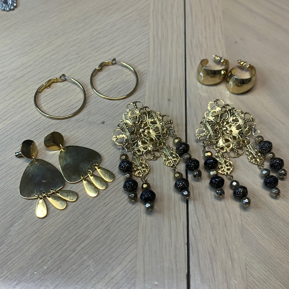 4 pair of gold toned earrings
